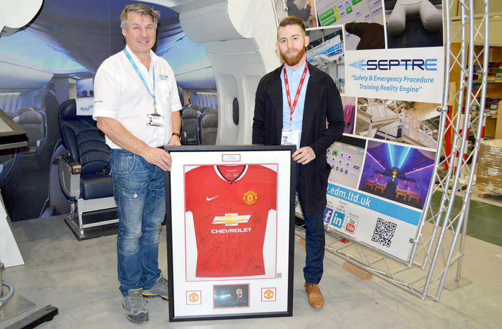 Man Utd shirt auction AT EDM LTD
